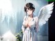 Anime girl with white wings standing in front of a window.